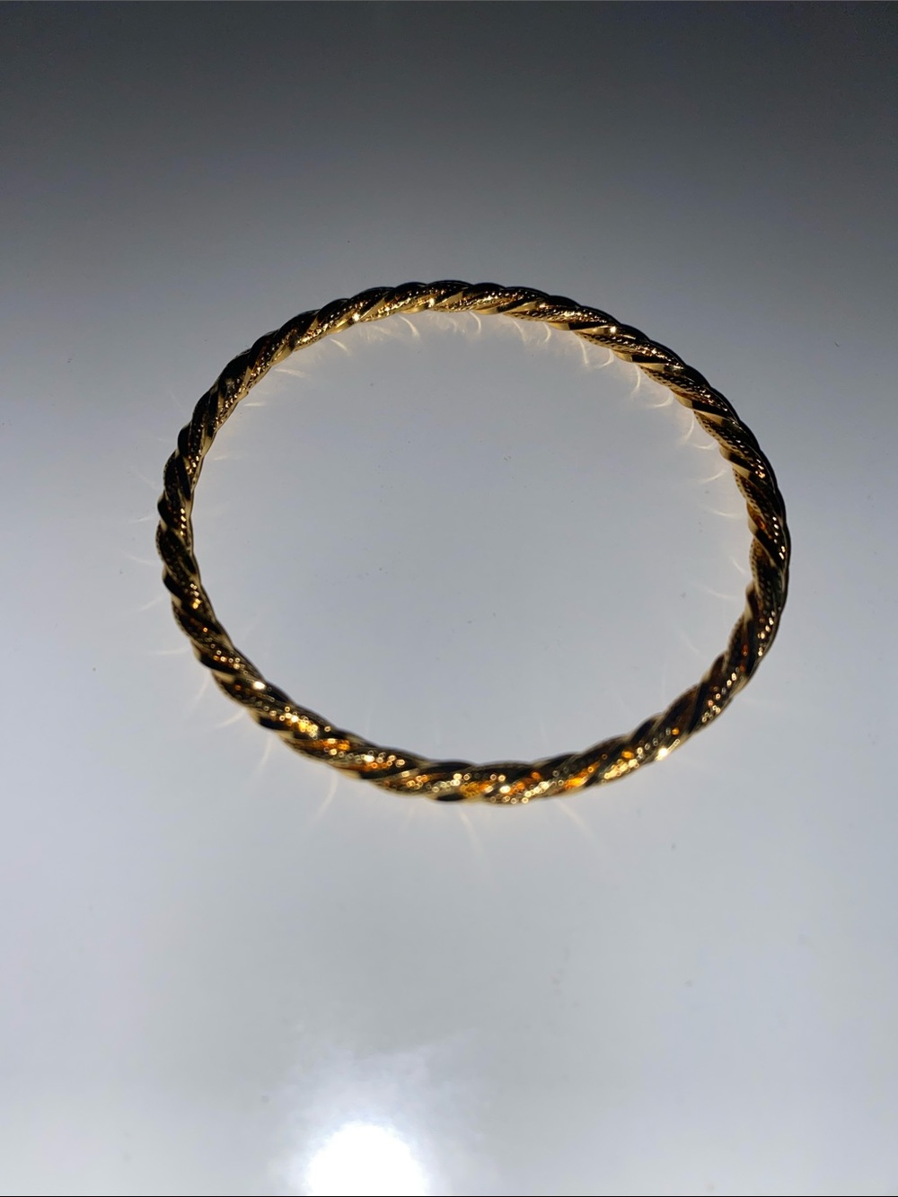 Elegant Gold-Tone Twisted Bangle Bracelet